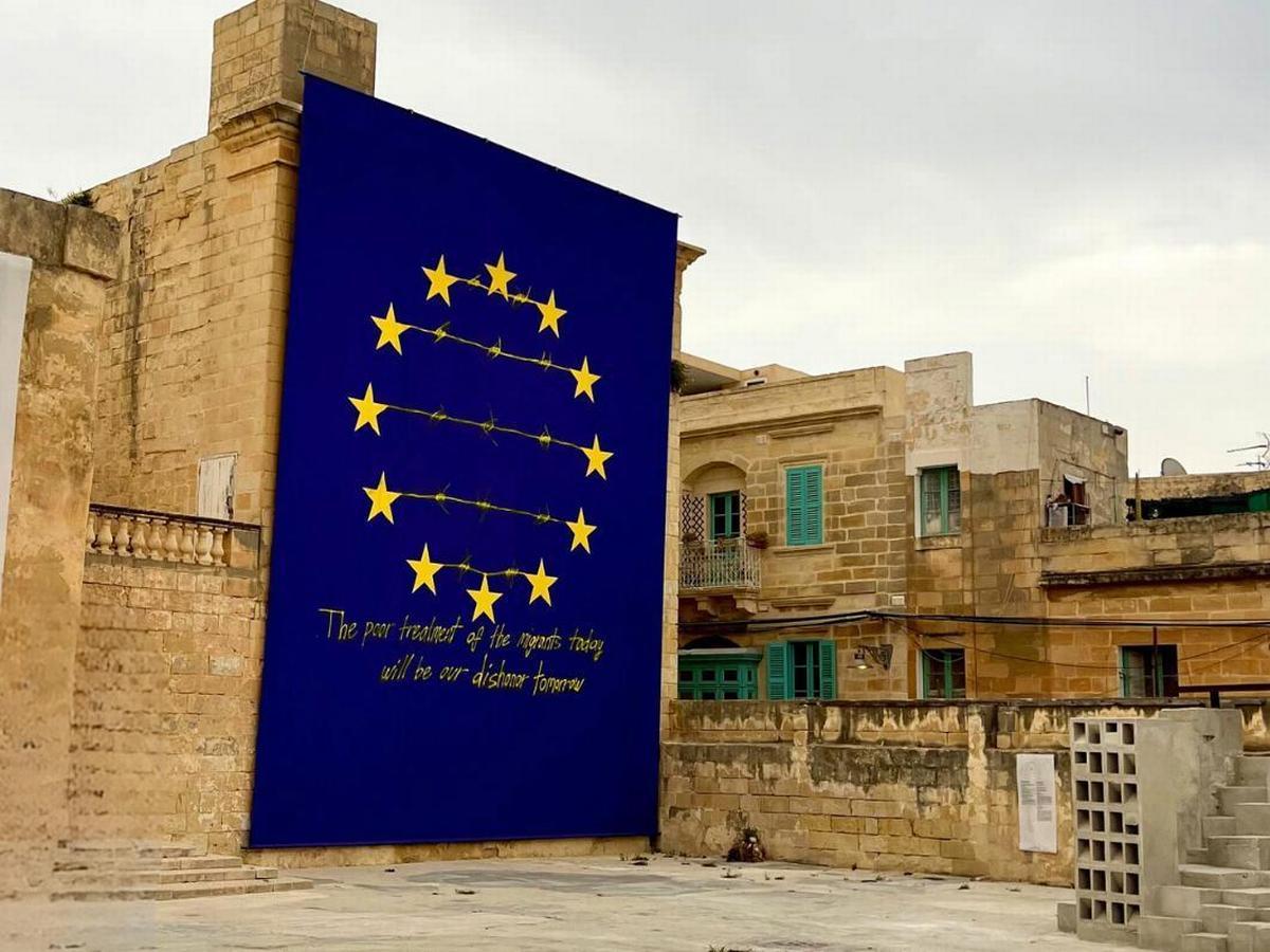 "The poor treatment of migrants today will be our dishonor tomorrow". Mural by Cuban artist Tania Bruguera in Malta. Photo by Clelia Vettori