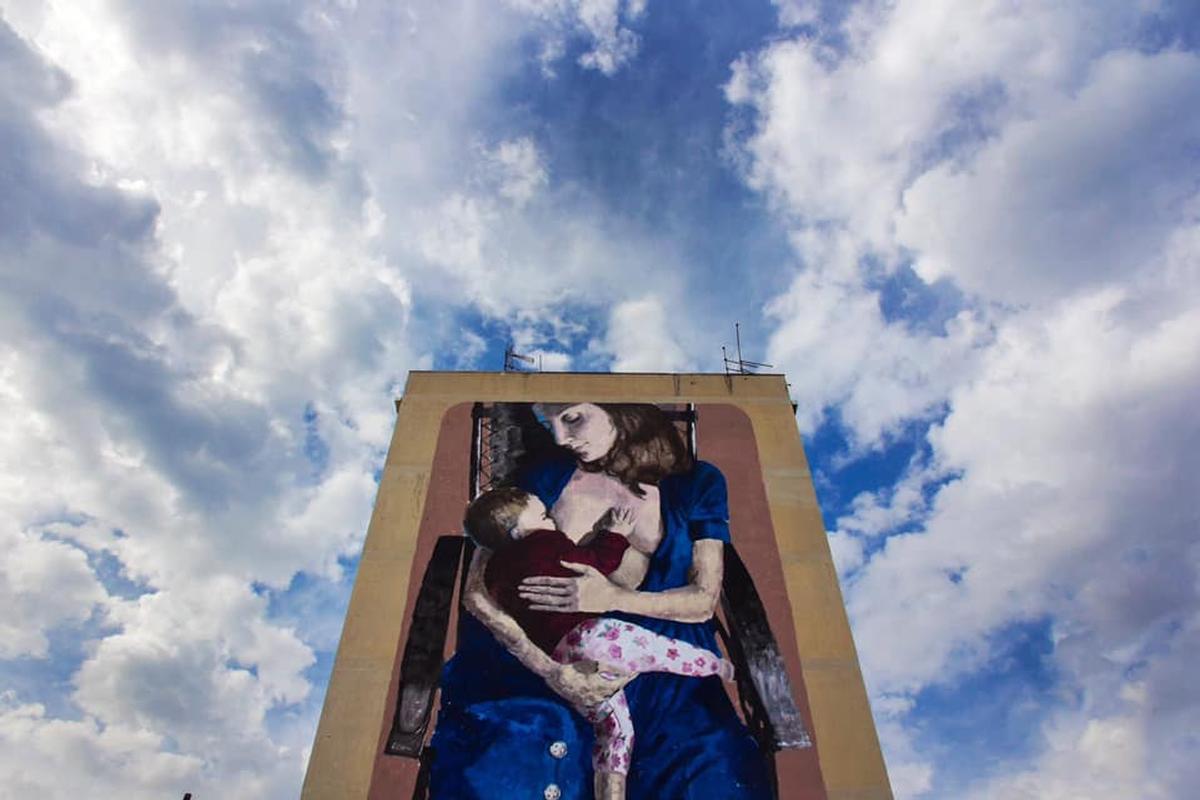 Il murales "Sangue e latti" realizzato da Igor Scalisi Palminteri nel quarteire Sperone a Palermo. Per il suo lavoro nelle periferie l'artista è stato ascoltato dalla commissione (Facebook)