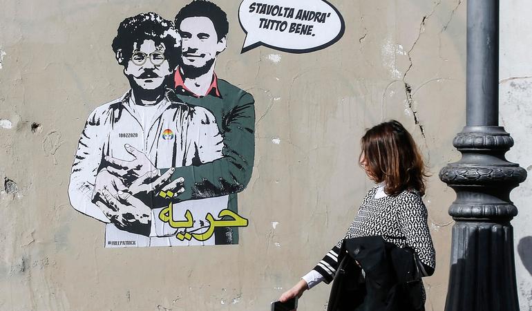 Murales dell'artista di strada Laika che raffigura Patrick George Zaki e Giulio Regeni. F. Frustaci/Ansa
