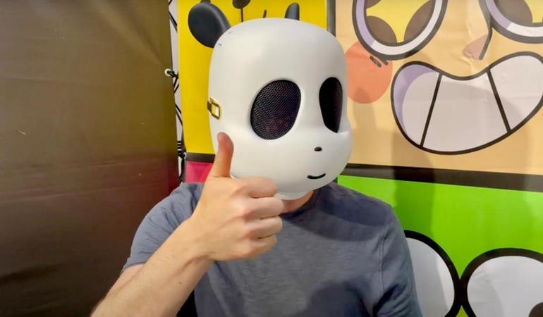 Torino, 10 maggio 2024. Il fumettista Giacomo Bevilacqua indossa la maschera di Panda al Salone del libro di Torino