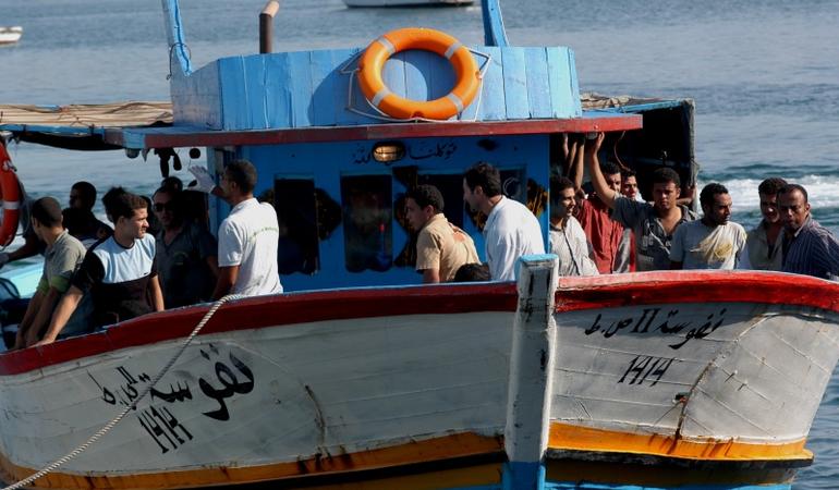 Migranti attraccati a Lampedusa, foto di Sara Prestianni