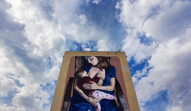 Il murales "Sangue e latti" realizzato da Igor Scalisi Palminteri nel quarteire Sperone a Palermo. Per il suo lavoro nelle periferie l'artista è stato ascoltato dalla commissione (Facebook)