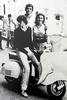 Giancarlo a bordo di una Vespa